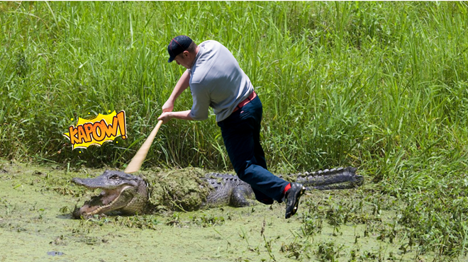 a man and a gator