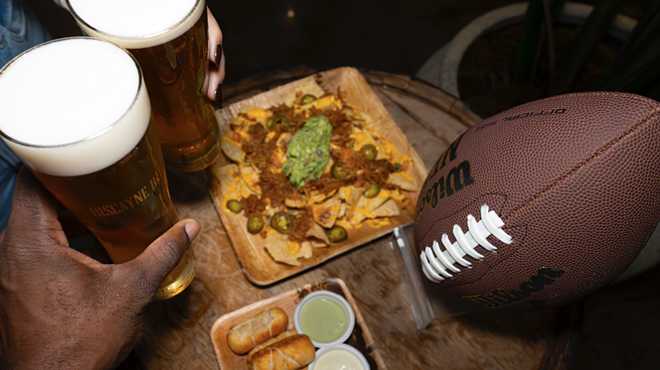 hands and beer and football
